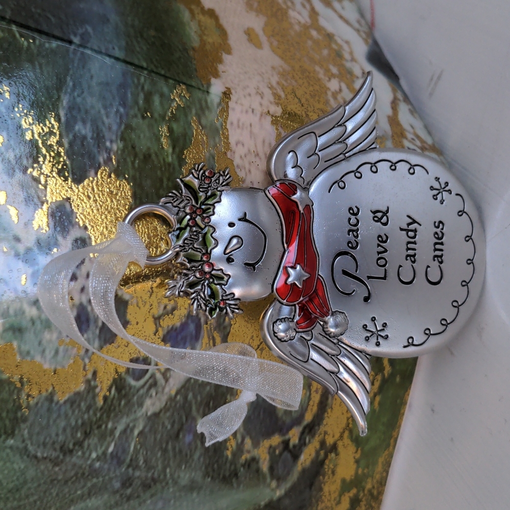 New metal snowman angel ornament ☃️